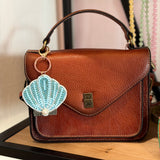 Nuni Copenhagen Charm 1 Bag Charm / Key Rings Shell-Turquise